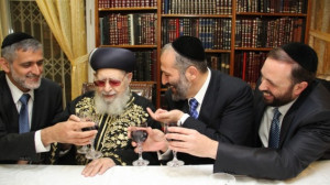 Shas founder Rabbi Ovadia Yosef (center) flanked on the left by MK Eli ...
