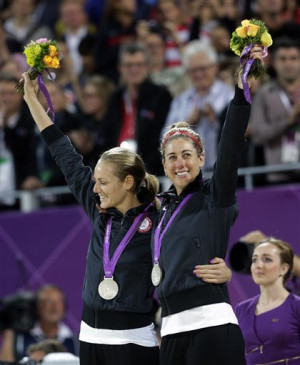 ... celebrate with their silver medals following the women s gold medal