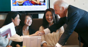 Joe Biden speaks to women in Japan. | AP Photo
