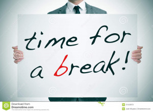 ... holding a signboard with the text time for a break written in it