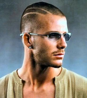 Photo of David Beckham buzz cut hairstyle with two lines.