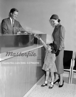 Stock Photo - 1950s MAN TELLER NEW ACCOUNTS IN BANK MOTHER WOMAN WITH ...
