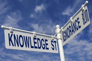 3668104-street-post-with-knowledge-st-and-ignorance-blvd-signs