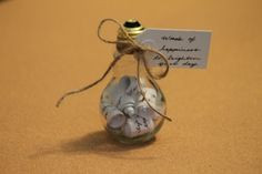 light bulb jar filled with uplifting happy sayings...happy thoughts to ...
