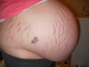 Rip Baby Tattoos Ripped bare baby bump.