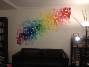 My new feature wall made from hundreds of paint colour samples.
