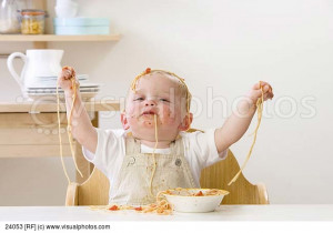 Messy Face Boy Eating Spaghetti Royalty Free Clipart Picture
