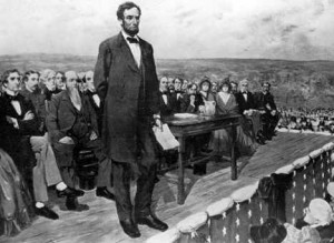 Abraham Lincoln delivers the Gettysburg Address during the Civil War ...