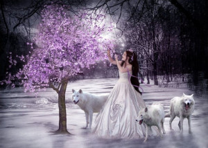 Princesa de la nieve con sus lobos en invierno