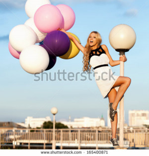 latex balloons. Beauty Romantic Girl Outdoors. Woman having fun ...