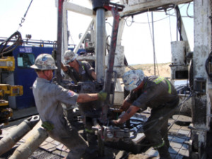 Roughnecks on a drilling rig.