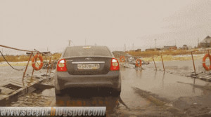 Truck-causes-pontoon-bridge-to-submerge