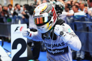 Lewis Hamilton celebrates winning in Malaysia