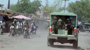Joint Military Task Force (JTF) patrol the streets of restive north ...