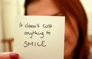 Happiness Quote : It doesn’t cost a thing to smile.