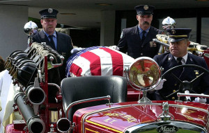 fireman clears his nose after the collapse of the twin towers of the