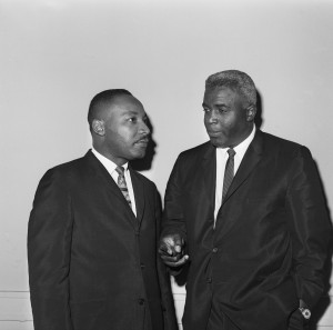 Jackie Robinson and Martin Luther King Jr. talk before a press ...