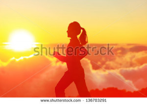 Runner woman running in sunshine sunset. Fitness athlete training ...