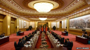 ... Li Keqiang (L) attend a summit meeting at the Great Hall of the People