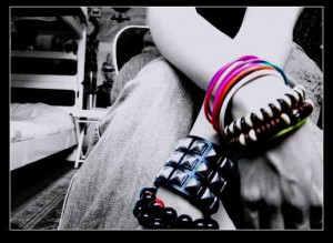 some bracelets on hands (imitation of imaginary cuts of veins);