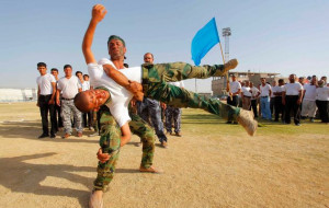 Shiite volunteers, who have joined the Iraqi army to fight ISIL ...