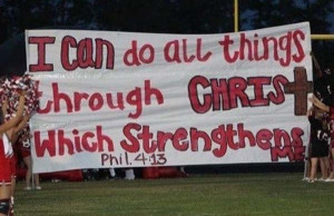 ... use of religious phrases in signs are appropriate at football games
