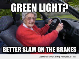 old woman senior citizen driving car green light slam breaks stop ...