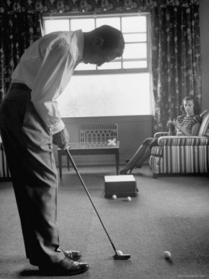 loomis-dean-golfer-ben-hogan-practicing-putting-in-his-town-house-with ...