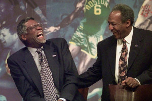 Bill Russell (l.) shares a laugh with entertainer Bill Cosby during a ...