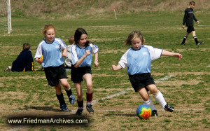 Kids and Sports /Girls Playing Soccer