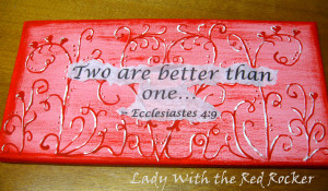 Next, I painted a layer of ModPodge on the canvas and placed the quote ...