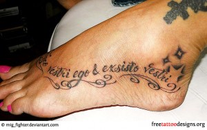 Latin quote tattoo on foot