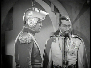 Flash Gordon with ray gun and Ming the Merciless