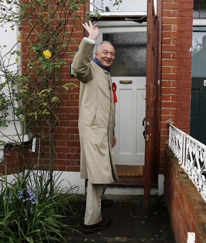 cheery wave from London's Mayor Ken Livingstone as he prepares to ...