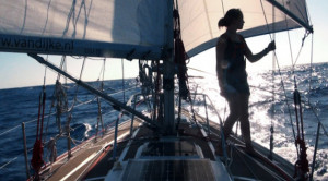 Laura Dekker* sailing Guppy, wing-on-wing)