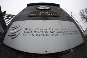 File photo of the World Trade Organization logo seen at the entrance ...