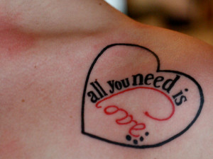 Here is a beautiful quote tattoo about love framed in a simple heart ...