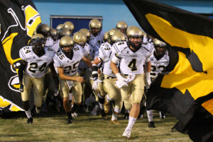 Hanna High School football team runs onto the field at J L Mann