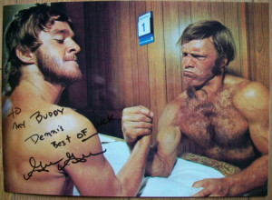 ... goalie Gilles Gratton in a mock arm wrestling pose with Bobby Hull