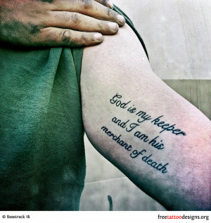 Soldier with a tattoo of a religious quote