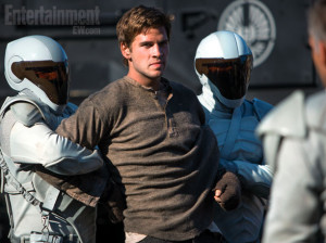 Gale being restrained by Peacekeepers.