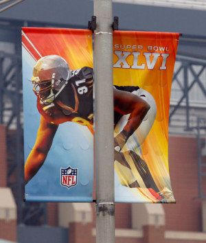 ... continue for Super Bowl XLVI in Indianapolis, Monday, Jan. 23, 2012