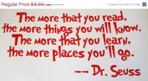 next to his bookshelf