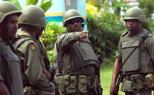 Fijian soldiers surround the house of Prime Minister Laisenia Qarase.