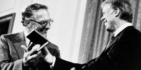 Robert Noyce accepting an award from President Carter