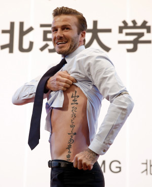 Na China, David Beckham fala sobre significado de suas tatuagens