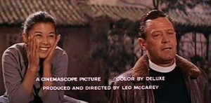 With William Holden , in the Satan Never Sleeps (1962) trailer