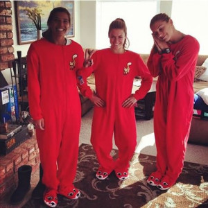 collection of professional footballers wearing onesies