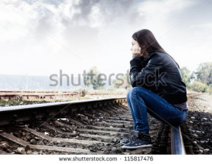 ... -on-the-tracks-looking-into-the-distance-and-thinking-115817476.jpg