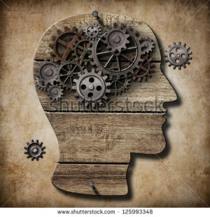 Human brain work metaphor made of rusty metal gears - stock photo